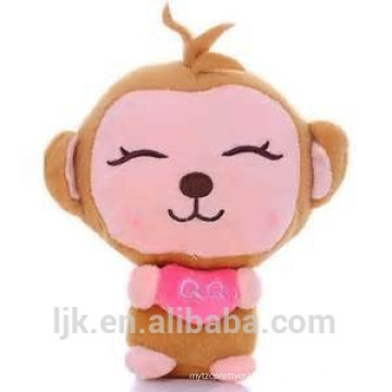 Cute plush monkey toy with heart
